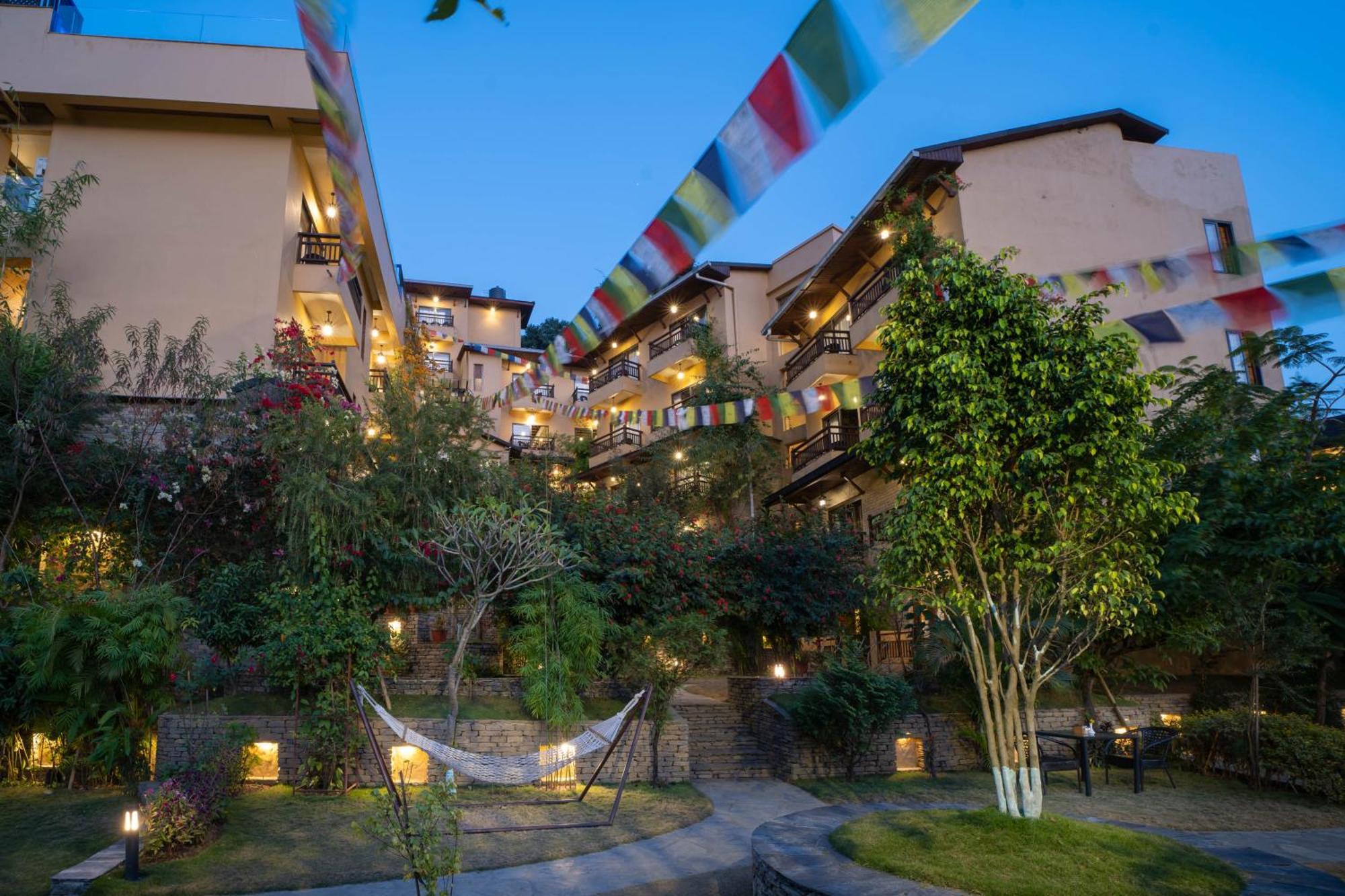 Bar Peepal Resort Pokhara Exteriör bild The hotel at night