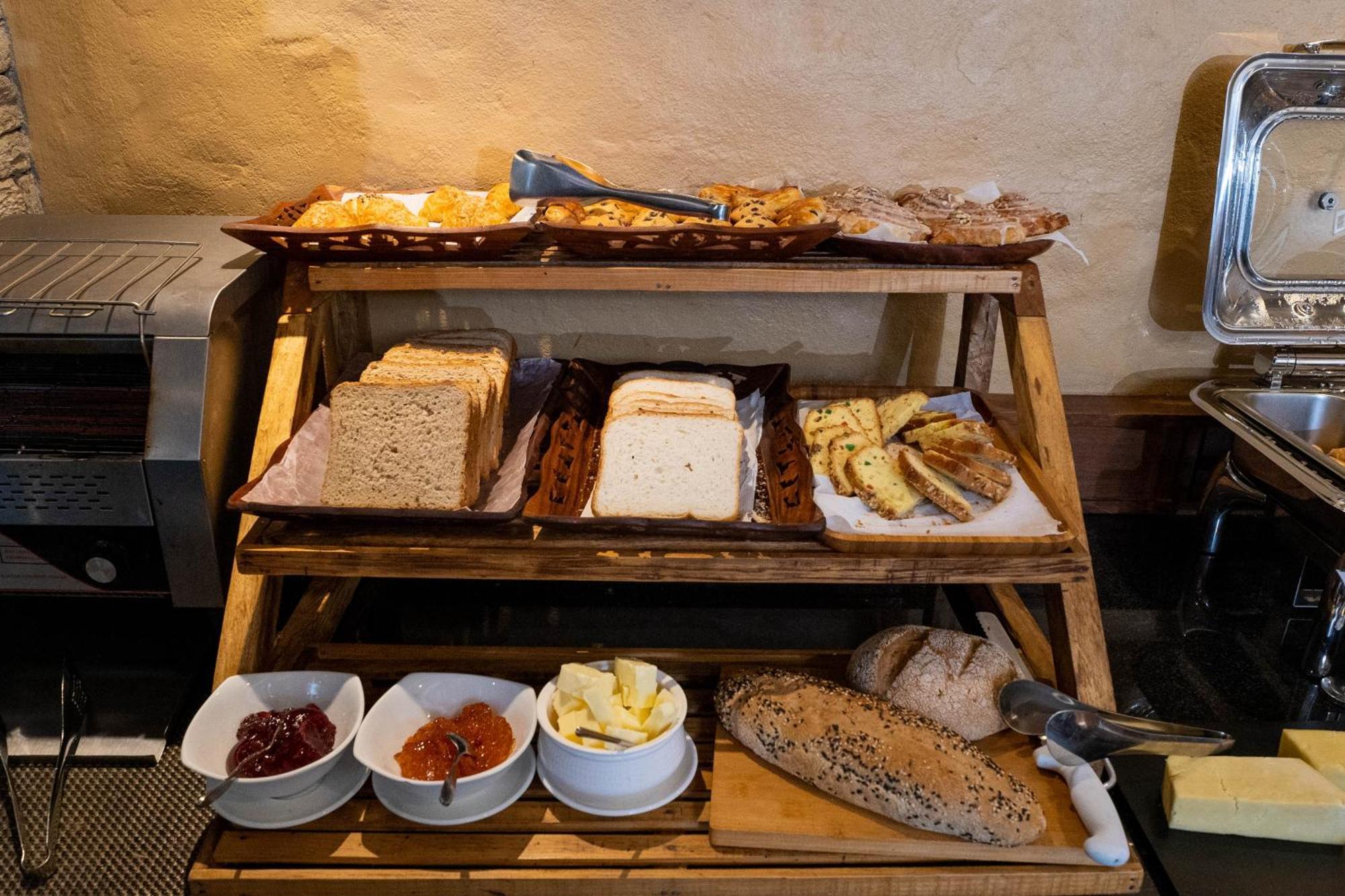 Bar Peepal Resort Pokhara Exteriör bild A selection of cheeses at a buffet