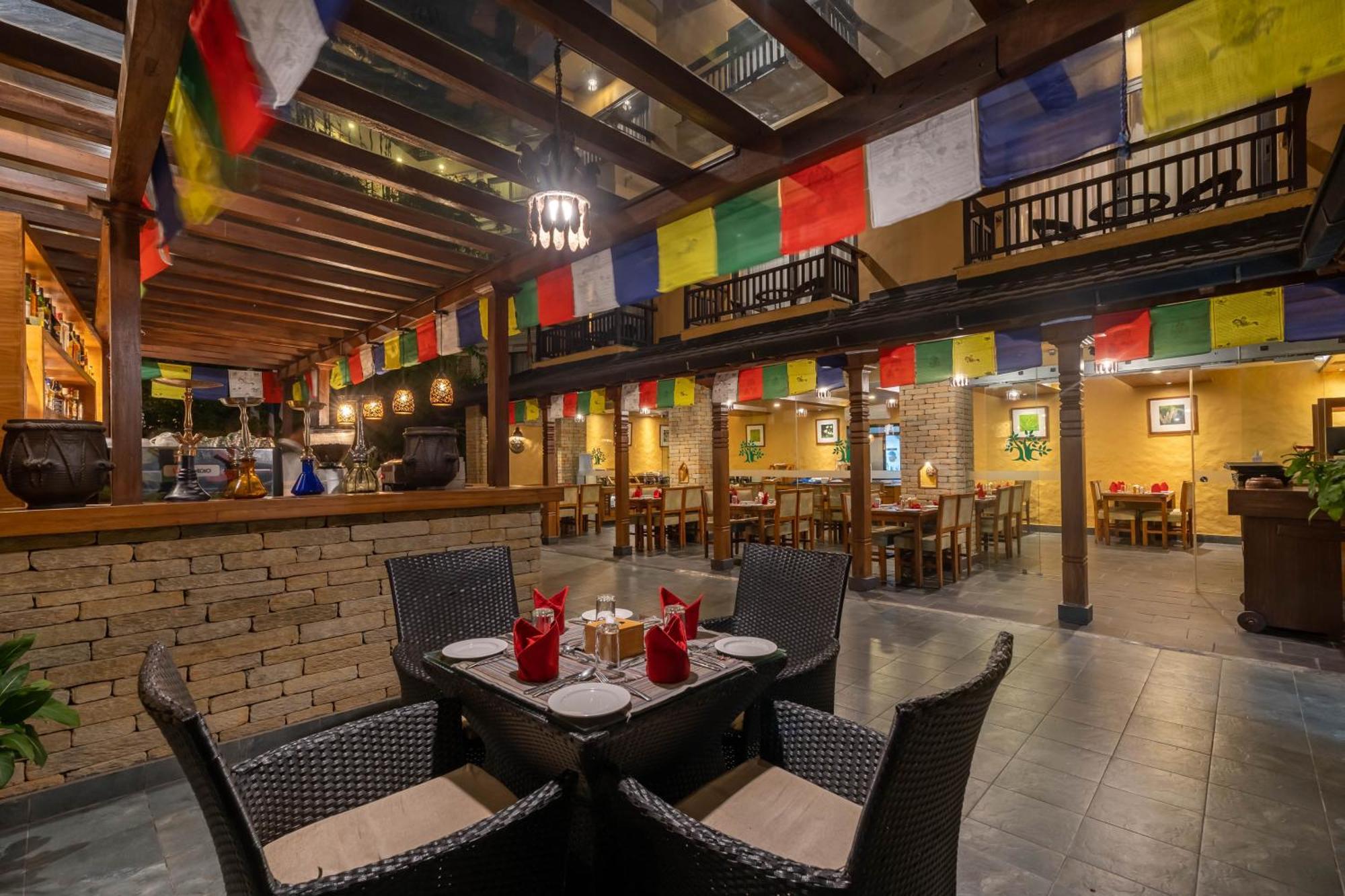 Bar Peepal Resort Pokhara Exteriör bild The interior of the restaurant