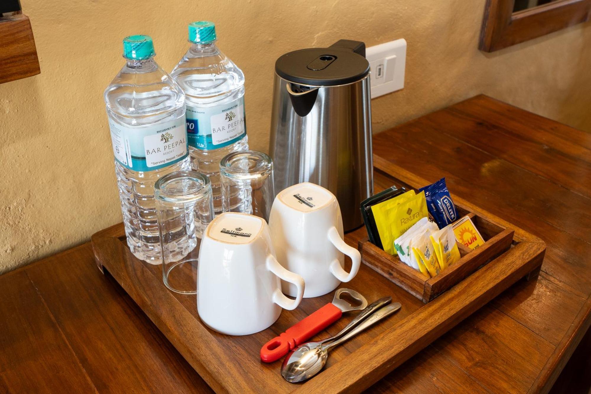 Bar Peepal Resort Pokhara Exteriör bild A tea tray